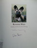 Running Wild: Dispelling The Myths of The African Wild Dog (Signed by both Photographers) | John McNutt and Lesley Boggs